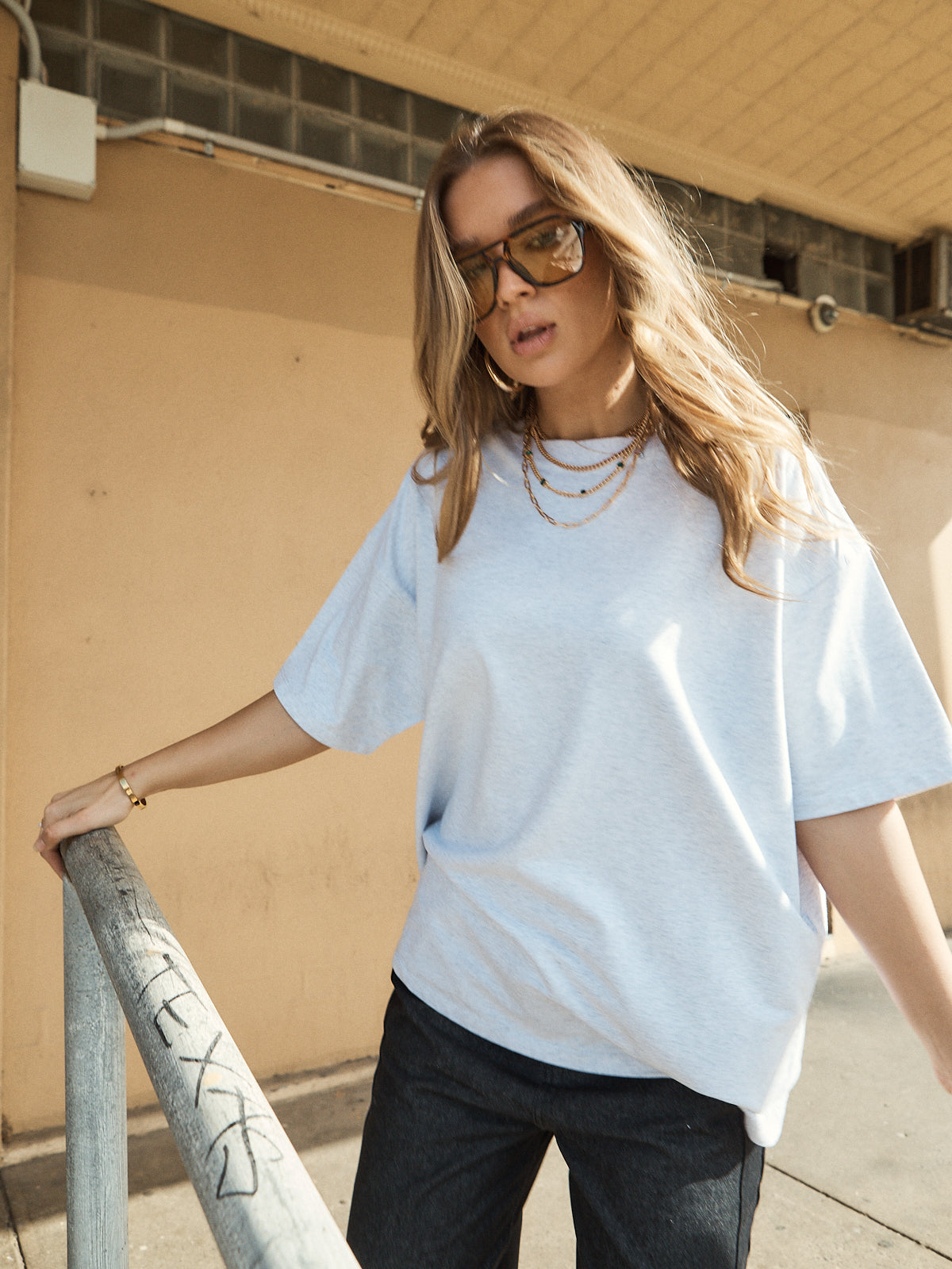Oversized crew neck grey marle t-shirt with relaxed unisex fit.