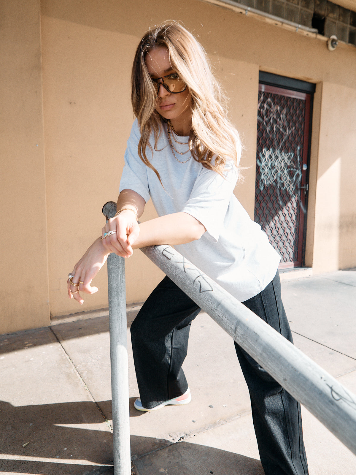 Oversized crew neck grey marle t-shirt with relaxed unisex fit.